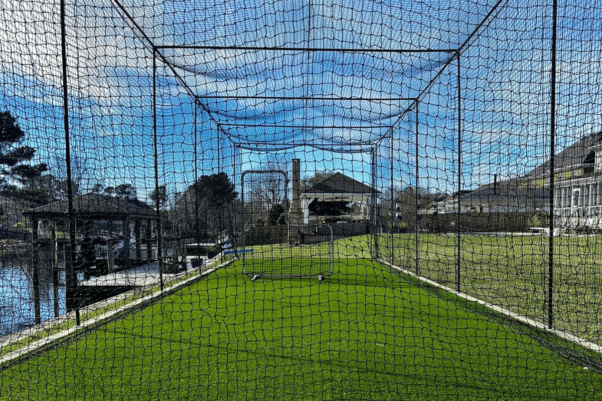 Premium regulation-length batting cage aerial installation
