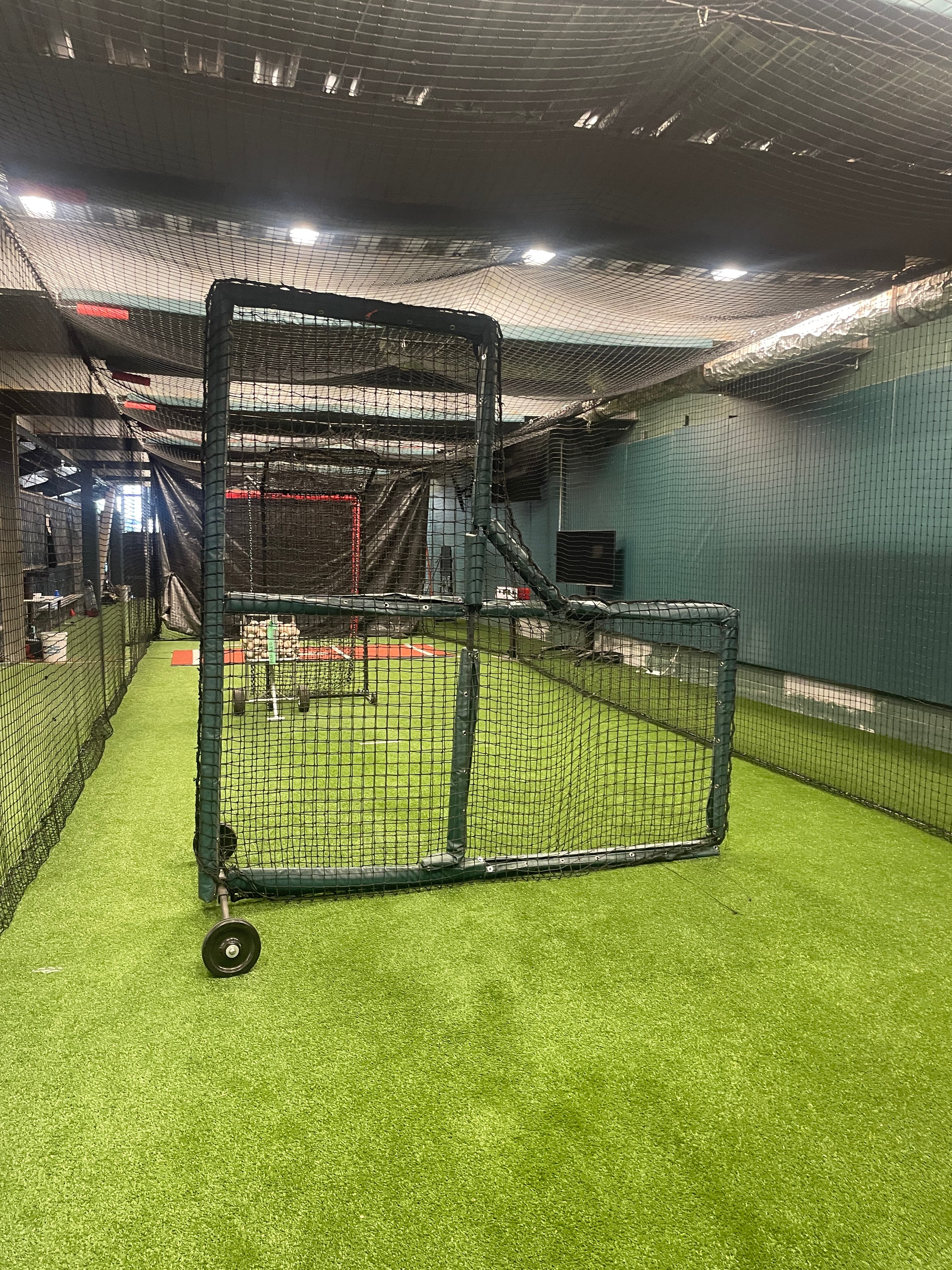 Indoor baseball academy batting cages