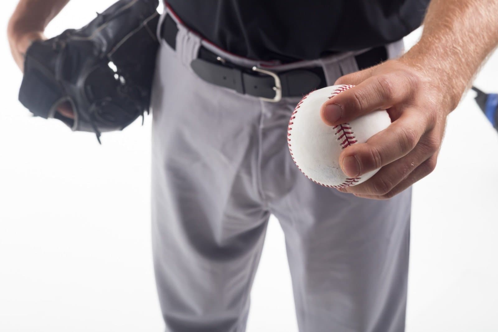 CageList founder Isaac Hess pitching during an outdoor training session