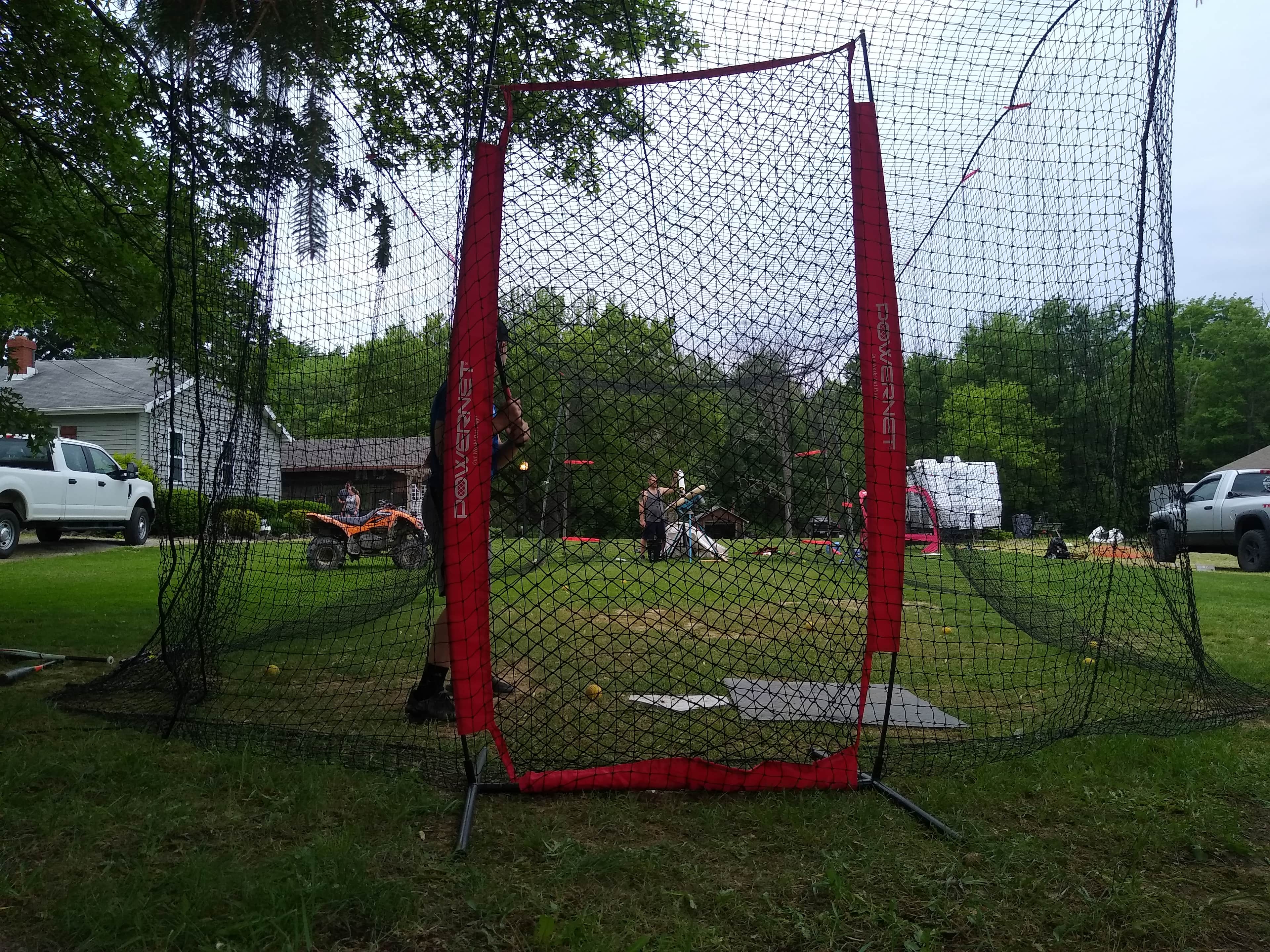Outdoor Batting Cage in Geneva, OH — Pitching Machine & Baseball photo 2