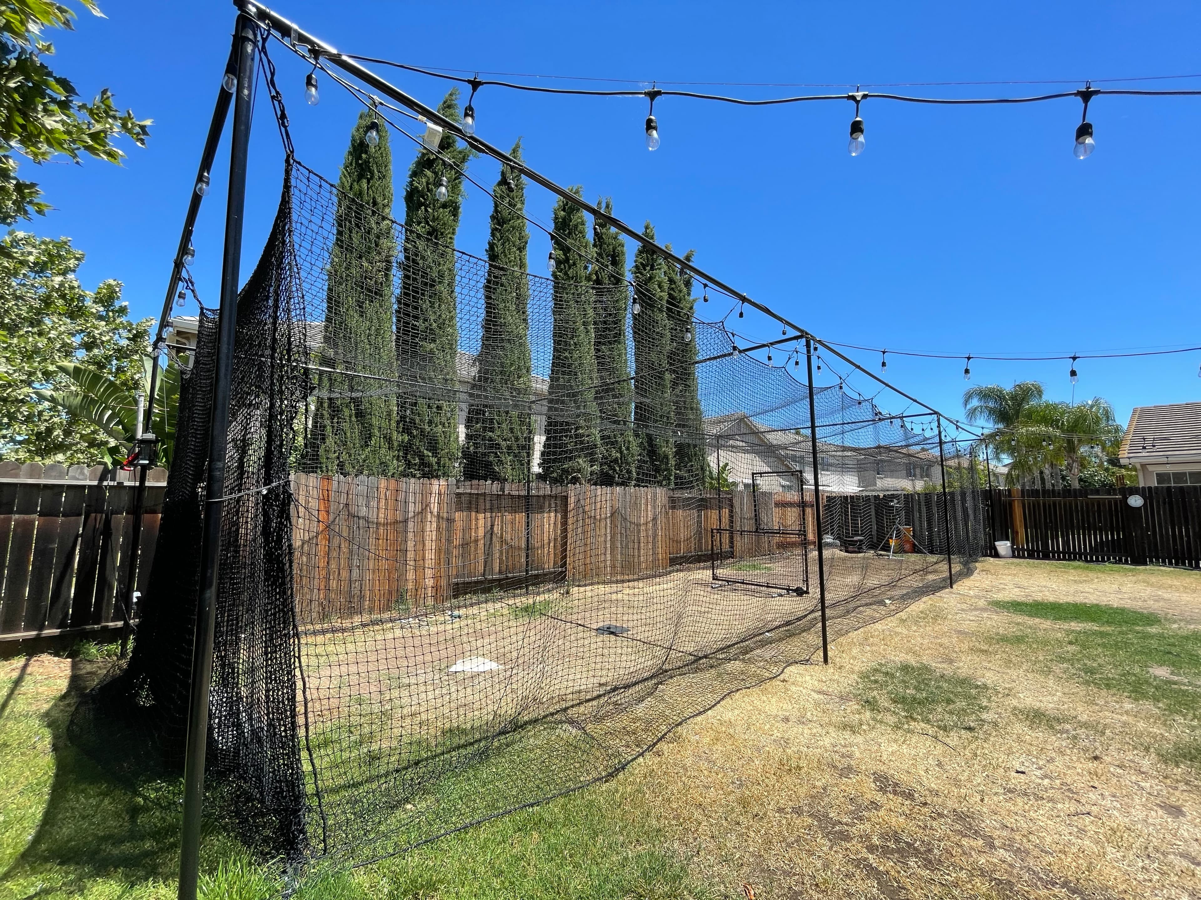Backyard Batting Cage in Elk Grove, CA — Pitching Machine & Lighted - Batting cage rental in Elk Grove, CA