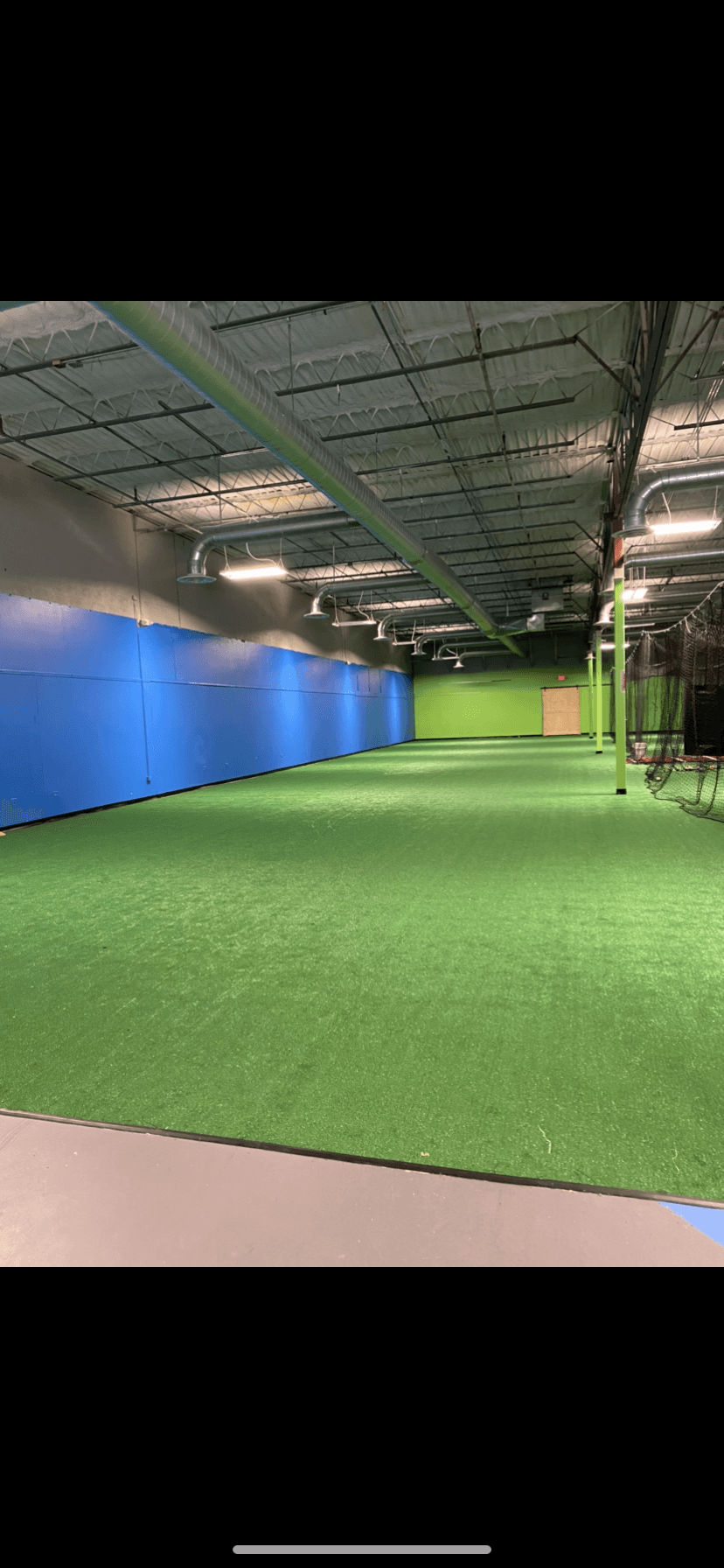 5 indoor batting cages with an open practice space photo 2