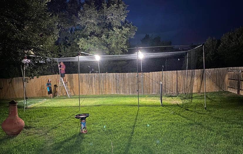 Lighted Batting Cage with pitching machine in Harker Heights, TX