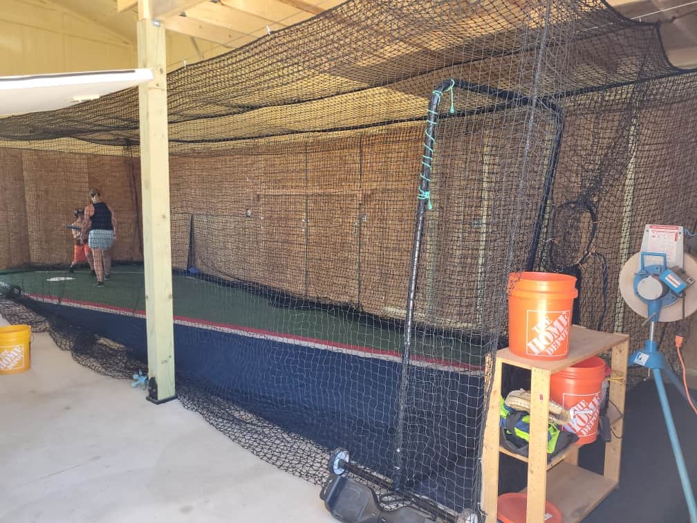 Smaller but effective training space with pitchng machne photo 2