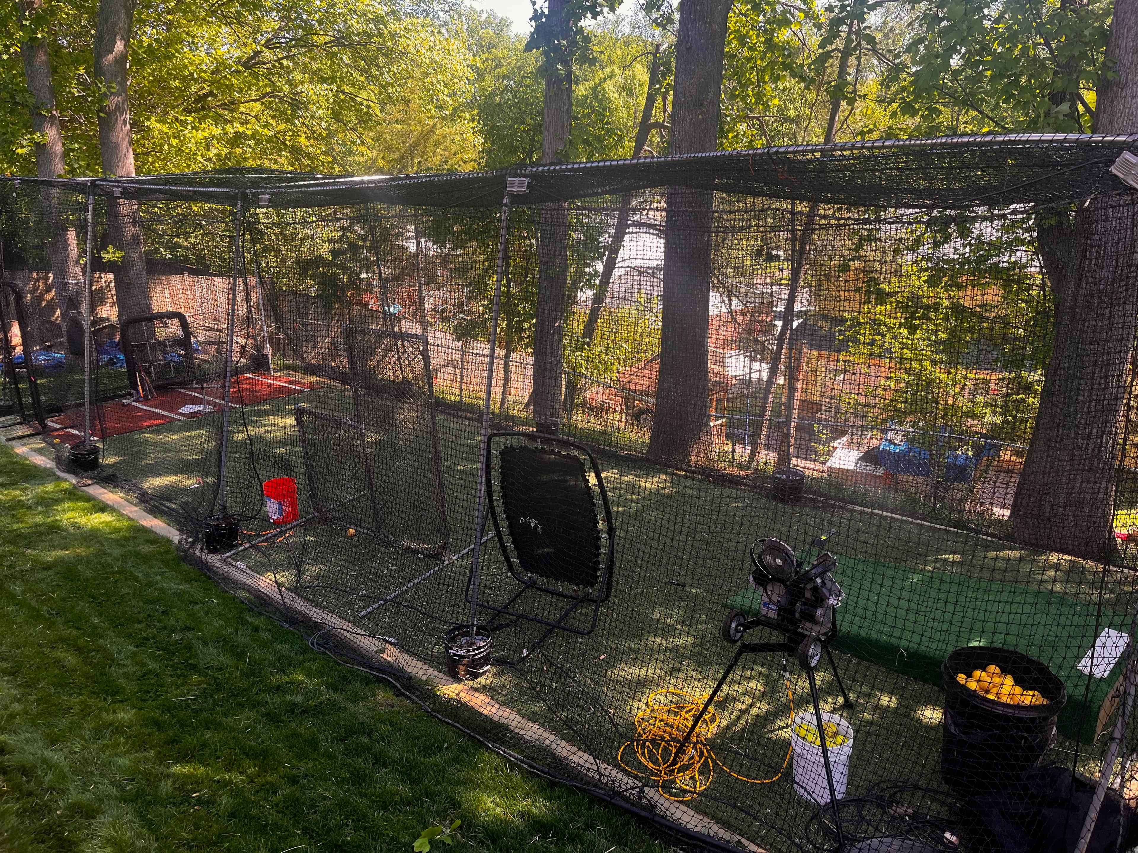 Fairfax, VA home turf cage w/mound, L-screen, machine, balls